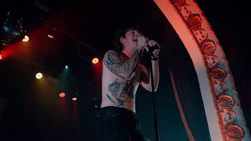 Cameron Whitcomb performing on tour